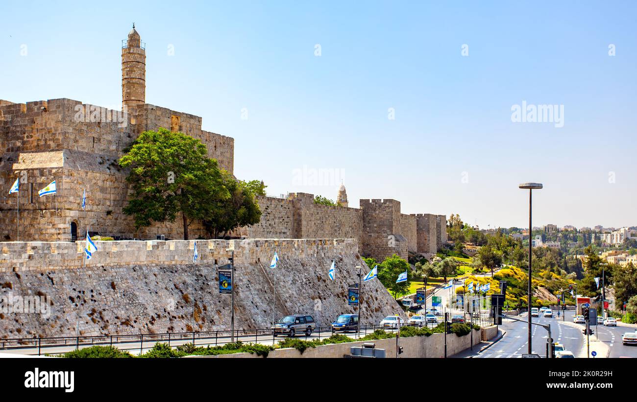 Jerusalem, Israel - May 20, 2009:  Walls of The Old Town of Jerusalem and road traffic near by Stock Photo