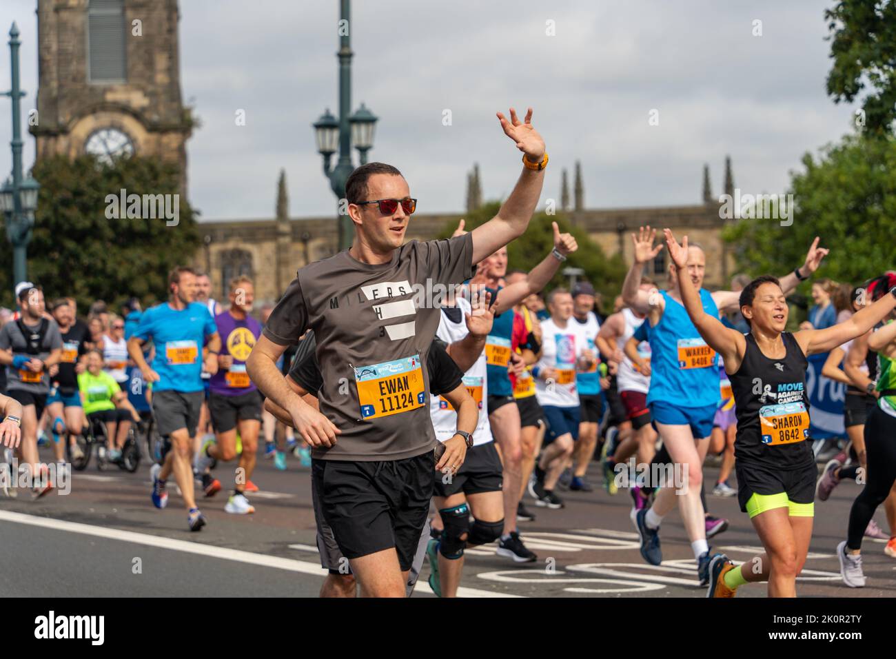 Competitors, Great North Run 2022 half marathon, in Gateshead, just after crossing over the Tyne Competitors, Great North Run 2022 half marathon, in Gateshead, just after crossing over the Tyne