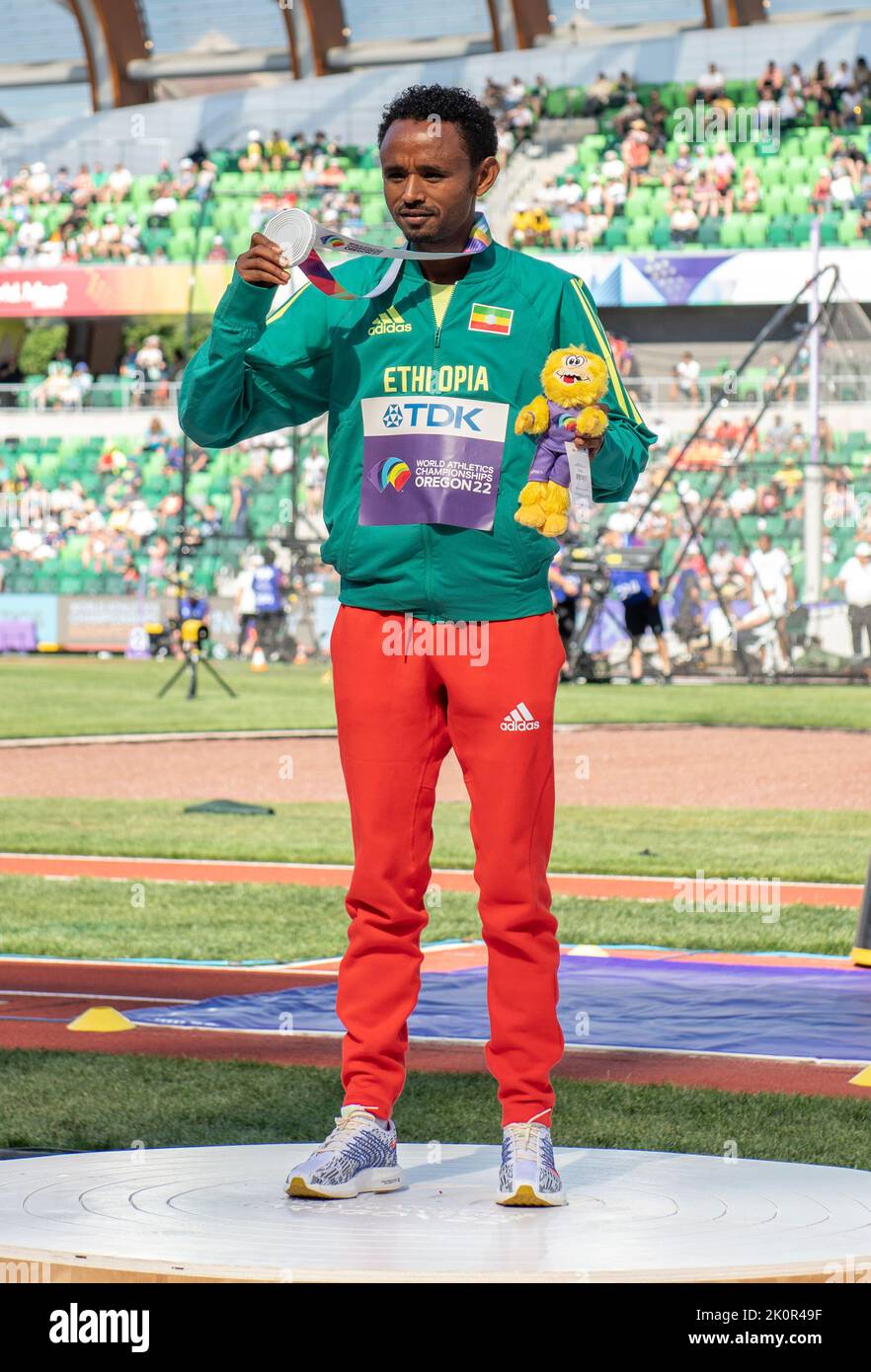 Tamirat Tola of Ethiopia receive’s his silver medal for competing in the men’s marathon at the