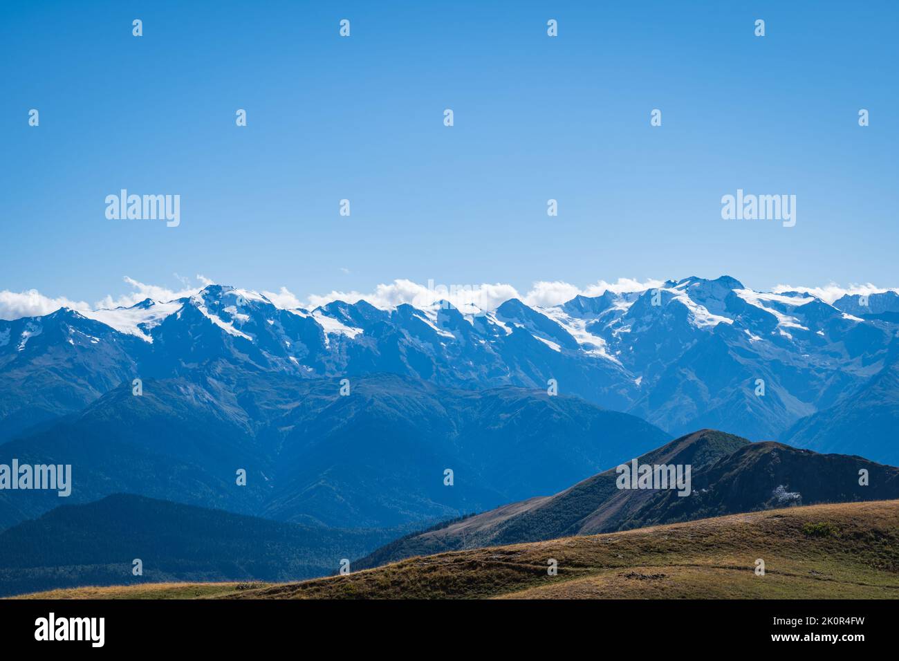 snow capped mountain range in Mestia, Svaneti region in Georgia. Landscape of mountain with snow in Caucasus Stock Photo