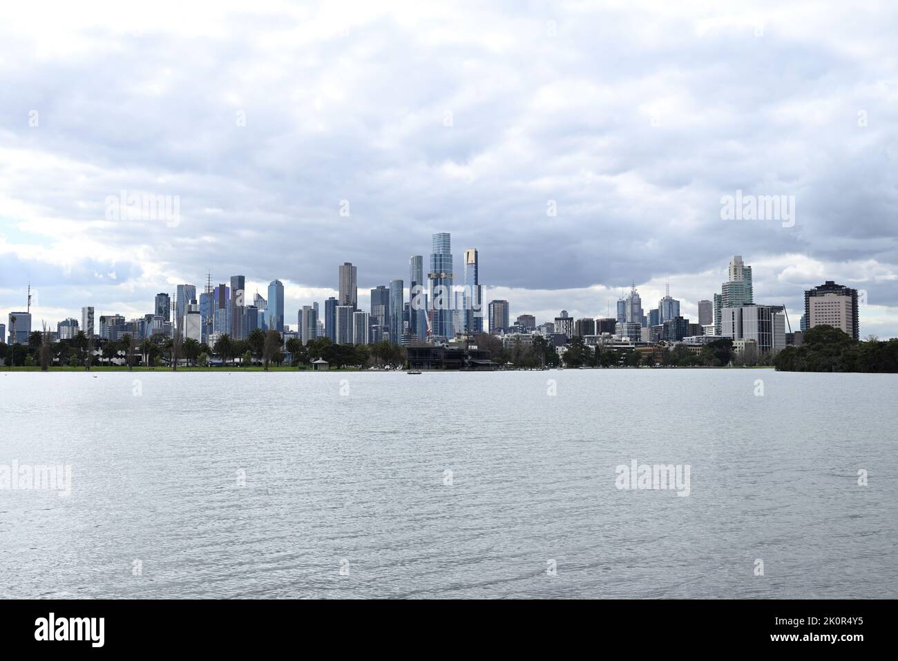 The south side of Melbourne's CBD, seen across Albert Park Lake during a cloudy day Stock Photo