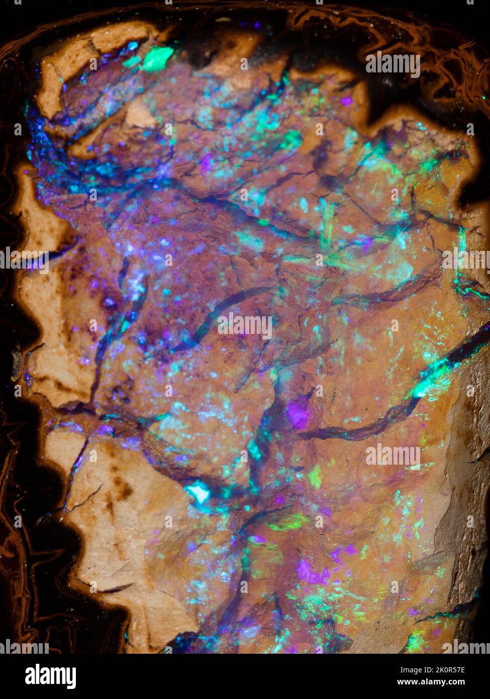 Australian Opal gemstones, shot on a black background to highlight the