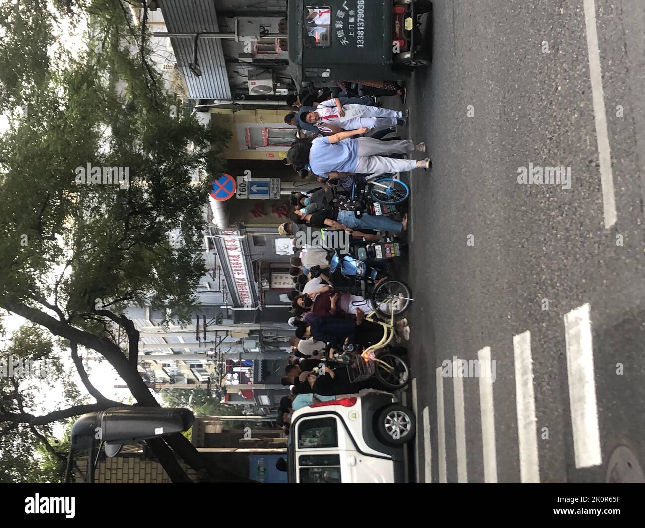 BEIJING, CHINA - SEPTEMBER 13, 2022 - A large number of parents pick up ...