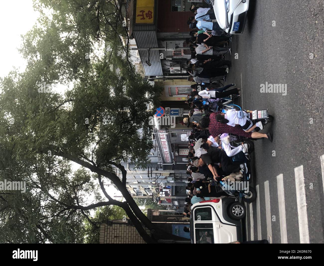 BEIJING, CHINA - SEPTEMBER 13, 2022 - A large number of parents pick up ...