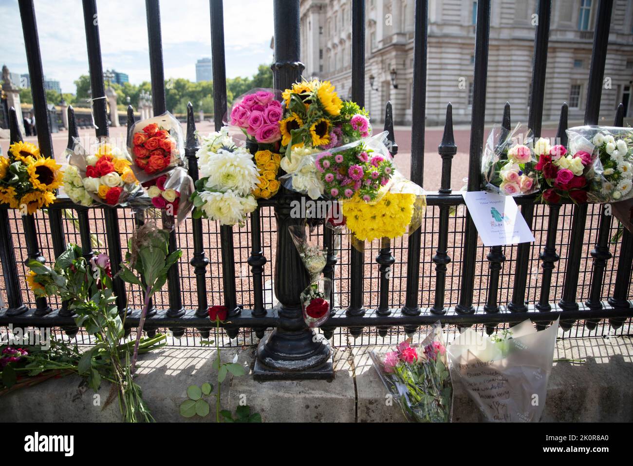 LONDON, UK September 2022 Flowers on the gates of Buckingham Palace