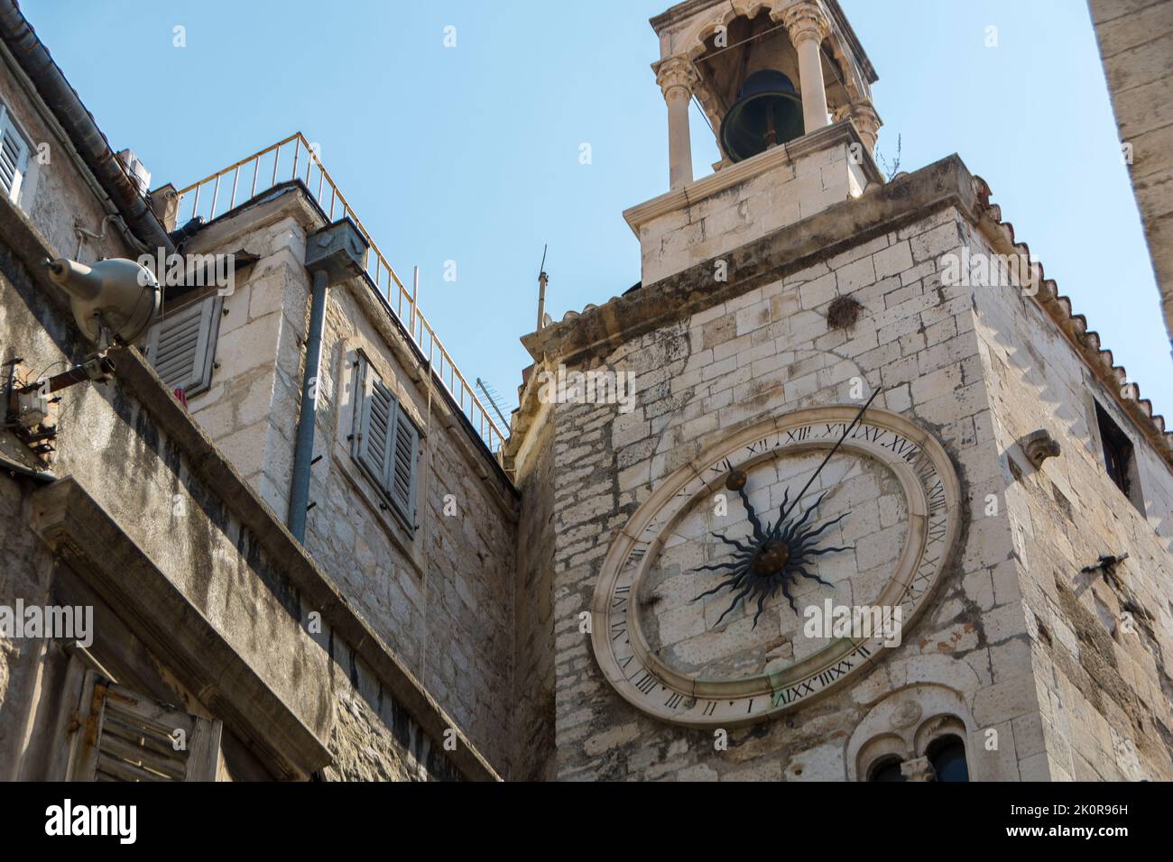 Belltower of the Church of Our Lady of Zvonik,Split, Croatia. Built into a small space within the ancient Iron Gate of Diocletian's western wall. Stock Photo