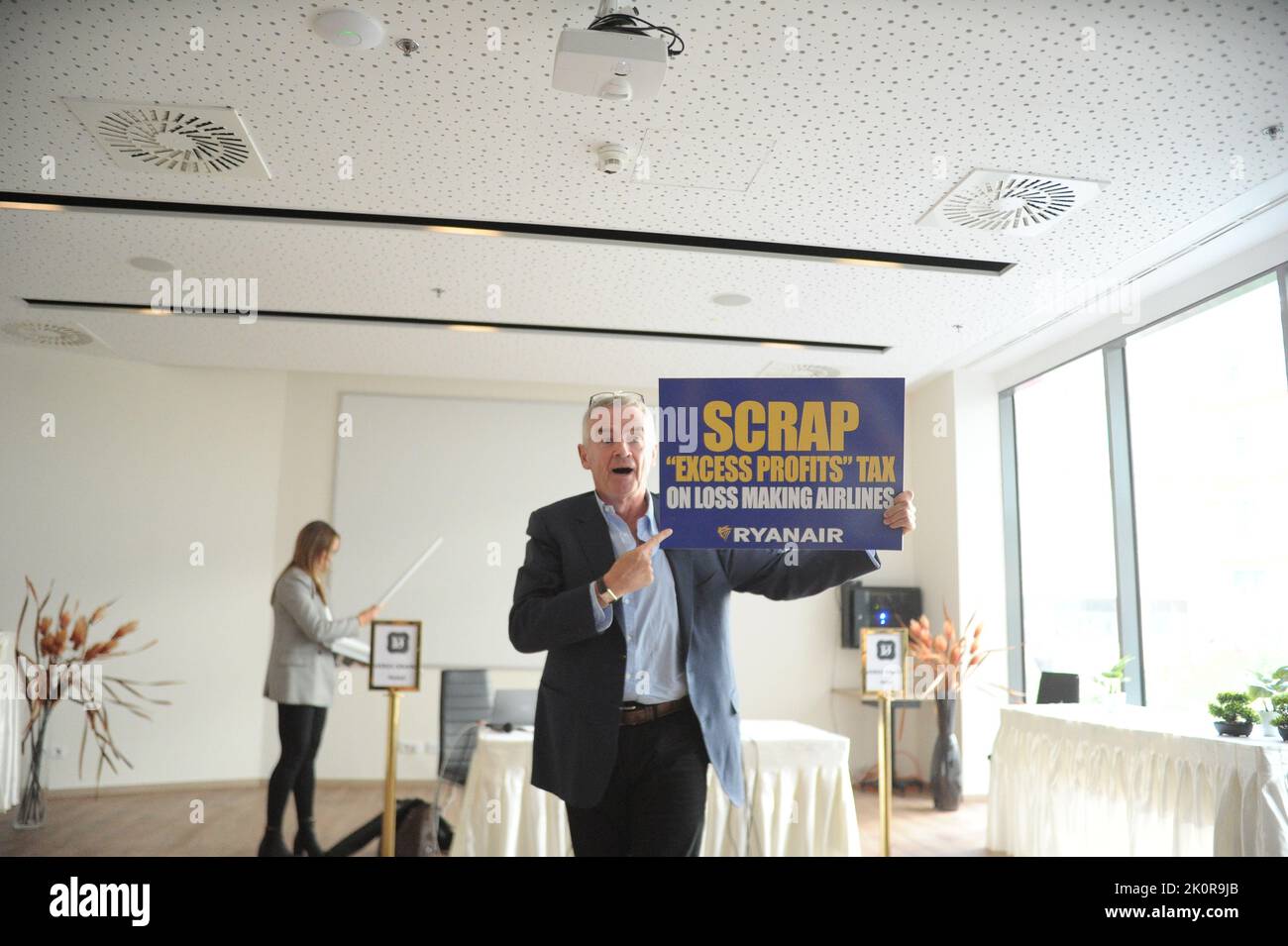 Budapest, Hungary, 13/09/2022, The CEO of Ryanair, Michael O’Leary holds a sign saying 'Scrap 'Excess Profits' Tax on loss making airlines', Budapest, Hungary, 13th Sep 2022, Balint Szentgallay / Alamy Live News Stock Photo