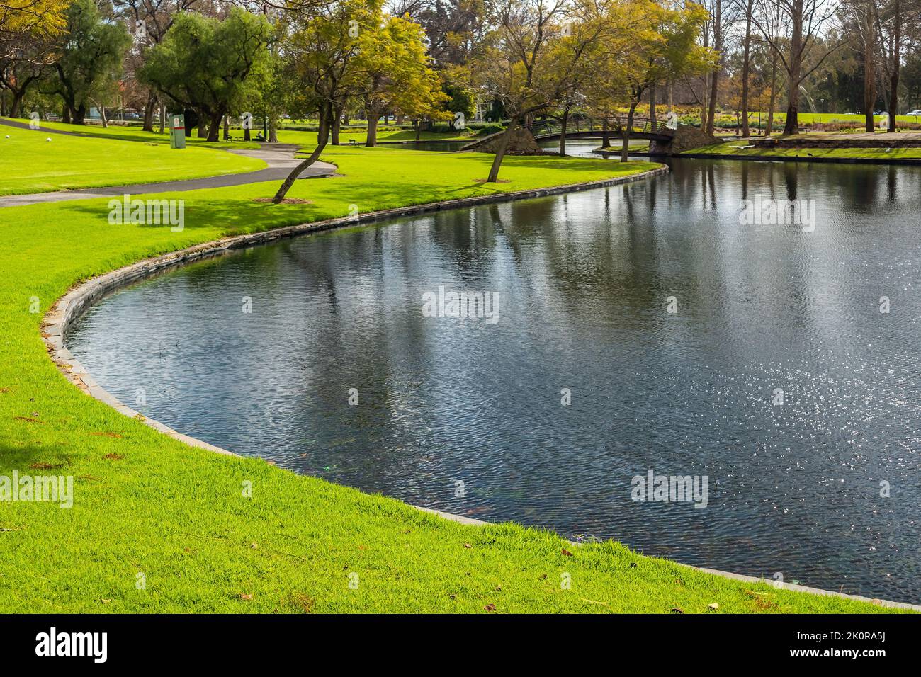 Rymill Park pond in Adelaide city on a sunny winter day. This place has been Adelaide's families favourite since the 1960s Stock Photo