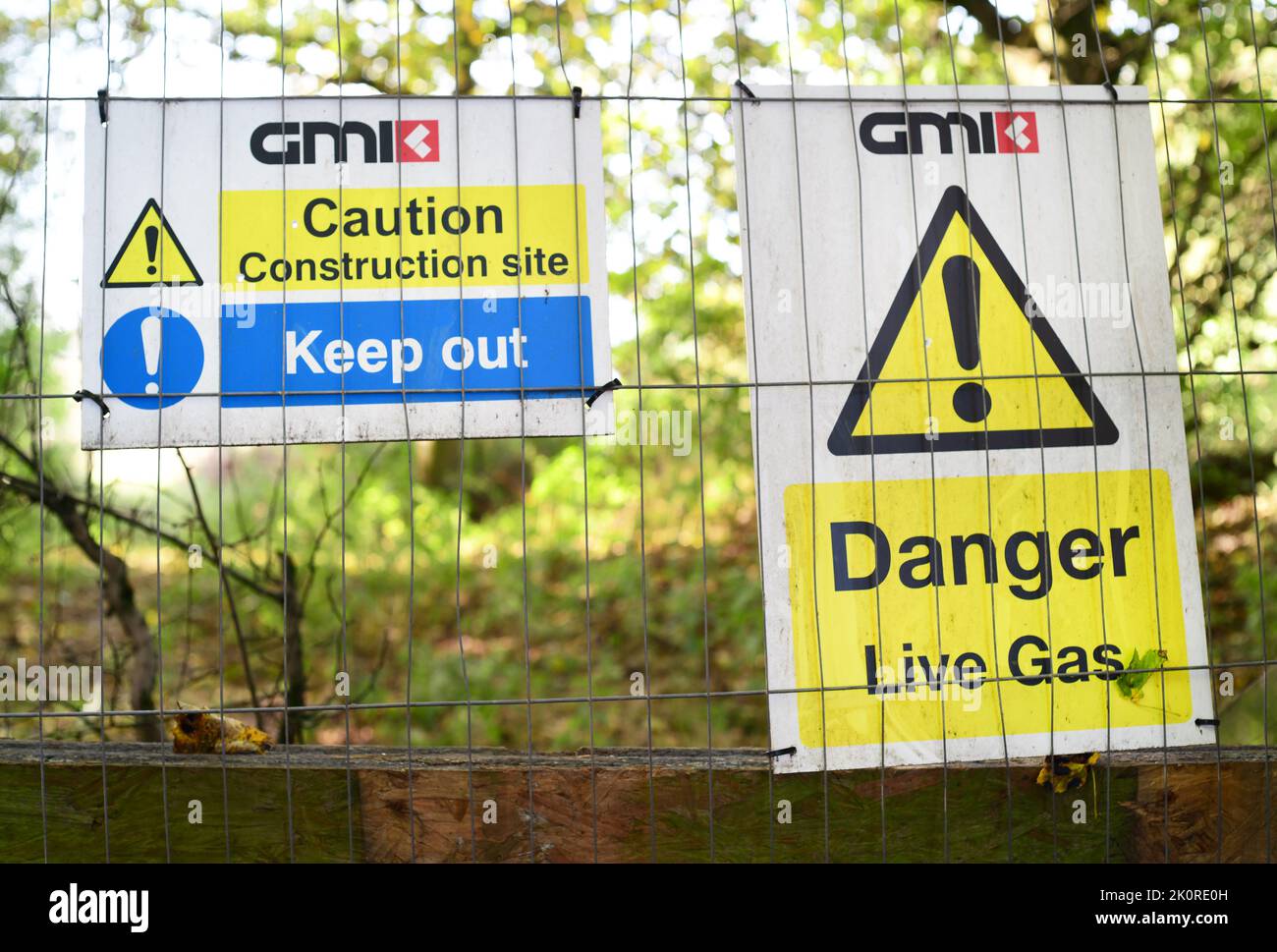 warning sign of live gas on construction site united kingdom Stock Photo