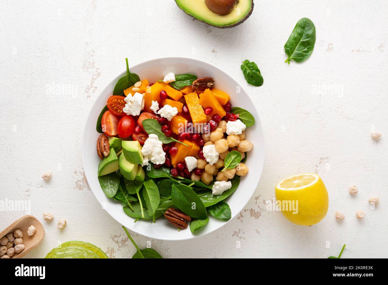 Overhead view of avocado and roasted pumpkin slice salad healthy food Stock Photo