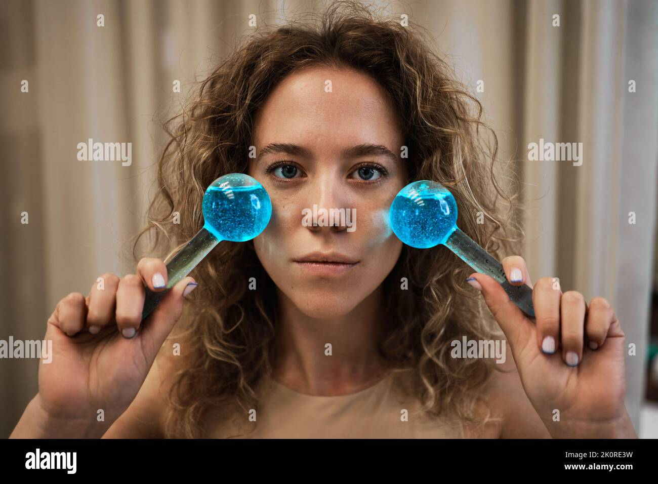 Facial massage with cold spheres Stock Photo Alamy