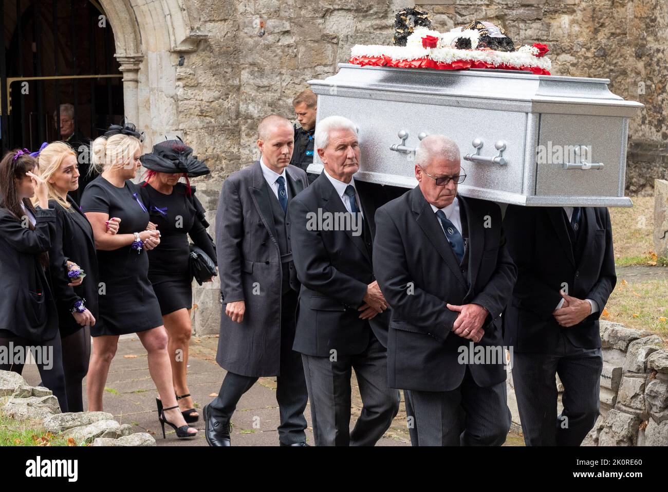 Prittlewell, Southend on Sea, Essex, UK. 13th Sep, 2022. A funeral service took place in St. Mary’s Parish Church in the Prittlewell borough of Southend on Sea for Archie Battersbee. The 12-year-old boy passed away after his life-support was turned off following months of legal battles by the family in an attempt to continue treatment. He was found unconscious and subsequently considered to have suffered brainstem death in April, but his family applied to various courts to prolong treatment until the legal decision to remove life support in August. Pallbearers and family Stock Photo