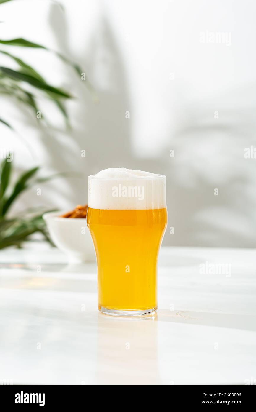One glass beer on white table food and drink Stock Photo
