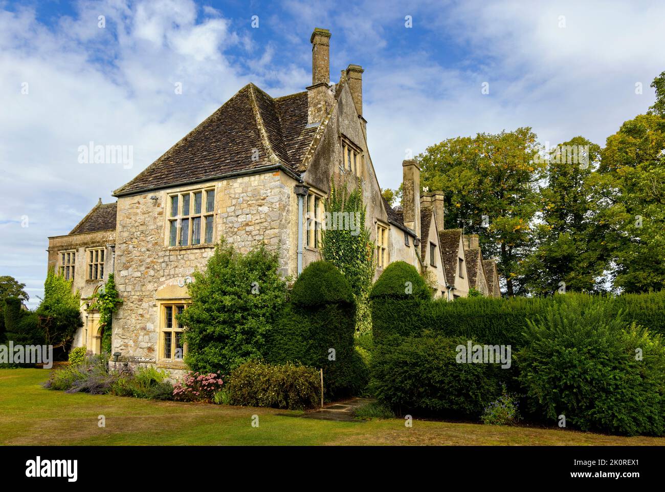 Avebury Manor, a Grade I listed early-16th-century manor house and its surrounding garden in Avebury, Wiltshire, England, United Kingdom. Stock Photo