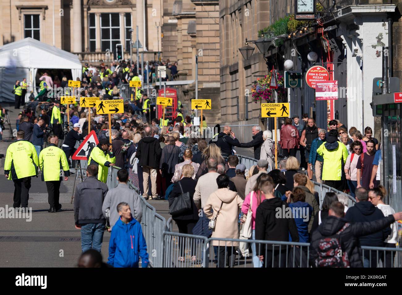 Edinburgh, Scotland, UK. 13th September 2022. Many members of the public queue to pay respects to Queen Elizabeth II who is resting inside St Giles Cathedral in Edinburgh  until returning to London this afternoon.  Iain Masterton/Alamy Live News Stock Photo