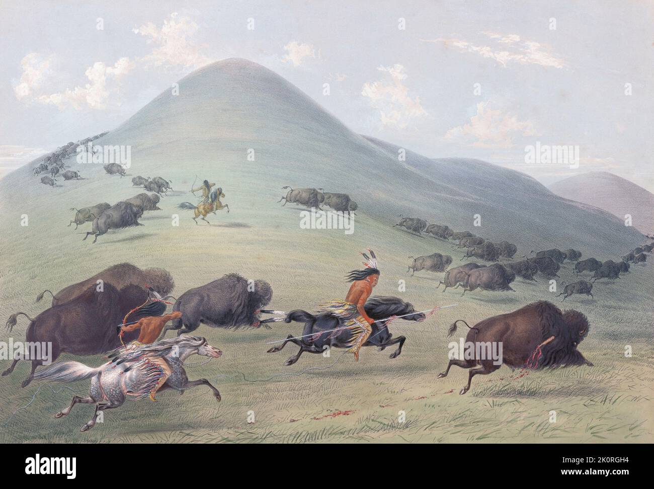 Plains Indians on horseback hunt buffalo with spears and bows and arrows.  American bison, B. bison.  From Catlin's North American Indian Portfolio, published in London 1844 by the artist, American adventurer George Catlin, 1796 - 1872.  During many journeys Catlin recorded with pen and brush the customs and life-styles of Native American tribes. Stock Photo