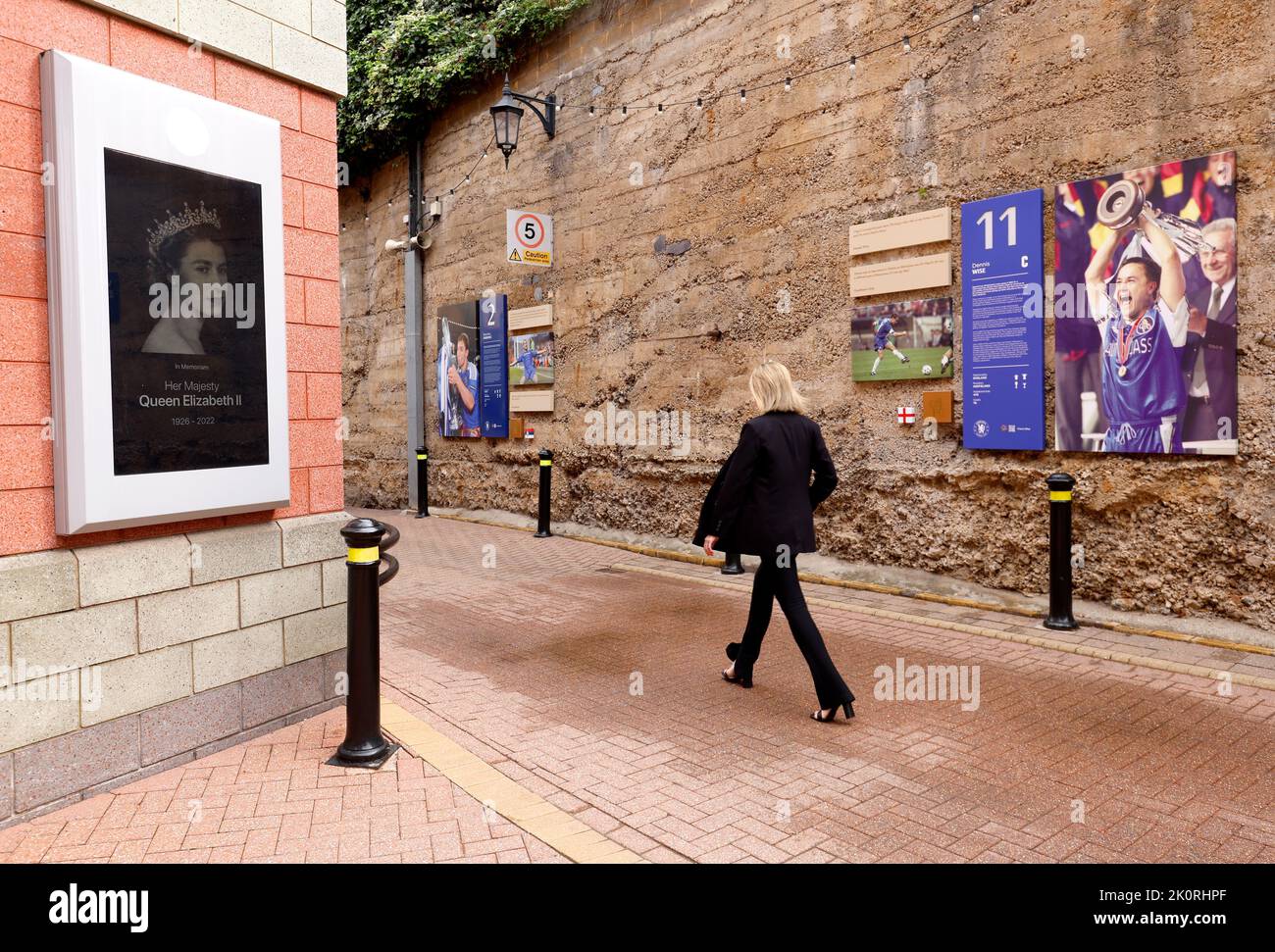 A tribute to Queen Elizabeth II is displayed on an advertising board at ...