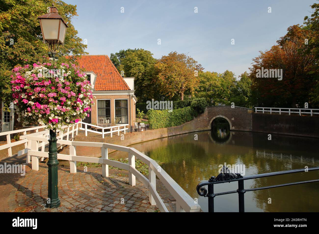 Waterpoortbrug bridge and historical houses viewed from Kippebruggetje bridge in the city center of Hoorn, West Friesland, Netherlands Stock Photo