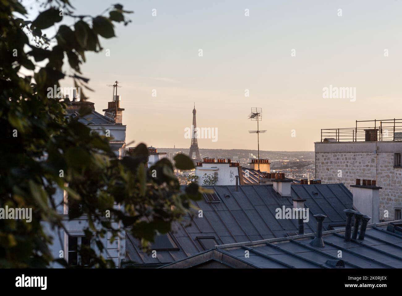 The Eiffel tower at sunset time from the top of Montmatre, Paris, France Stock Photo