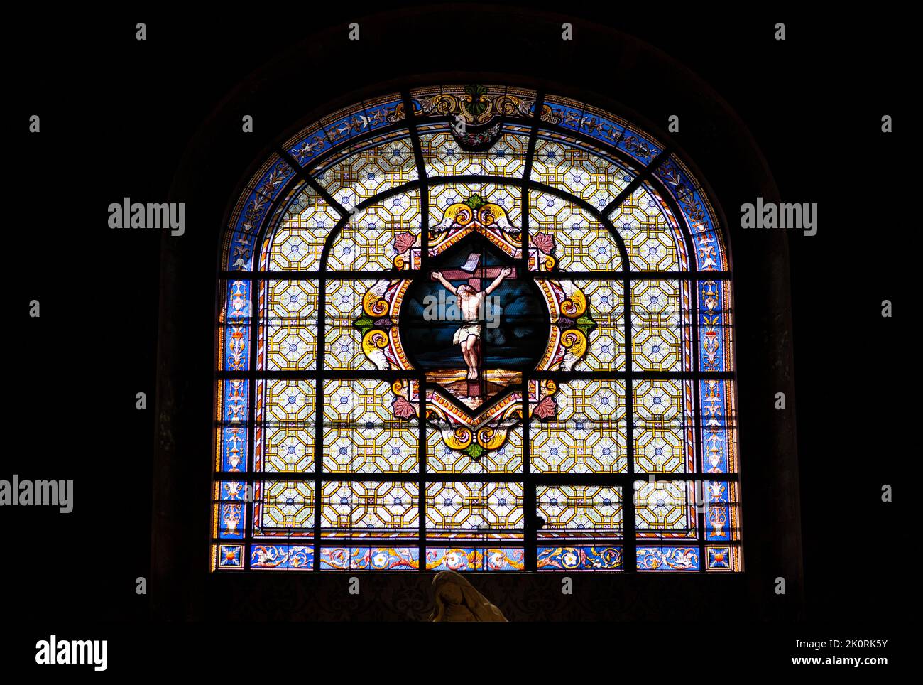 Crucifixion in the stainedglass window of the Sacred Heart of