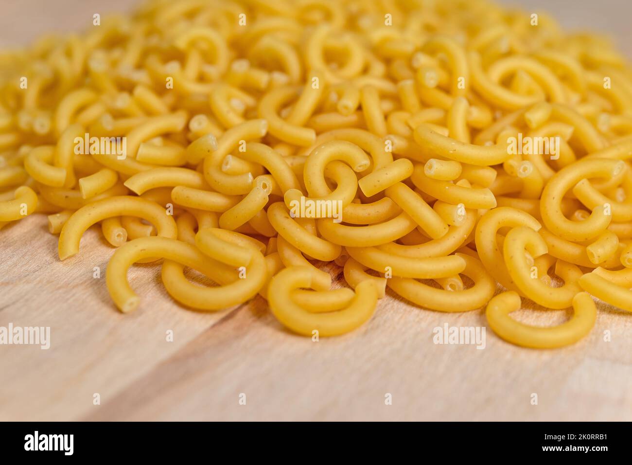 Noodles on a wooden plate Stock Photo