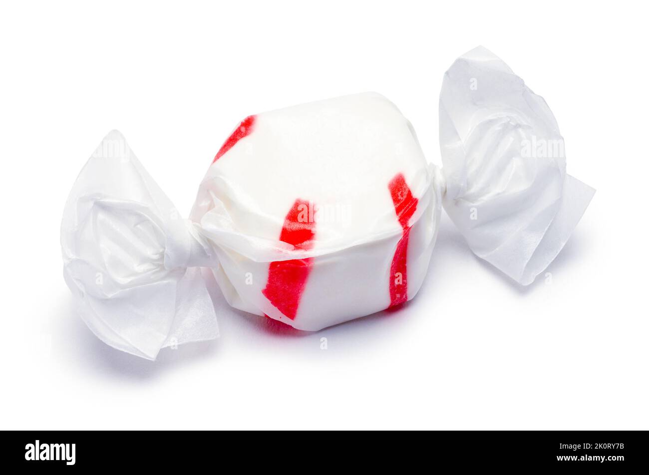 Wrapped Piece of Peppermint Taffy Cut Out on White. Stock Photo
