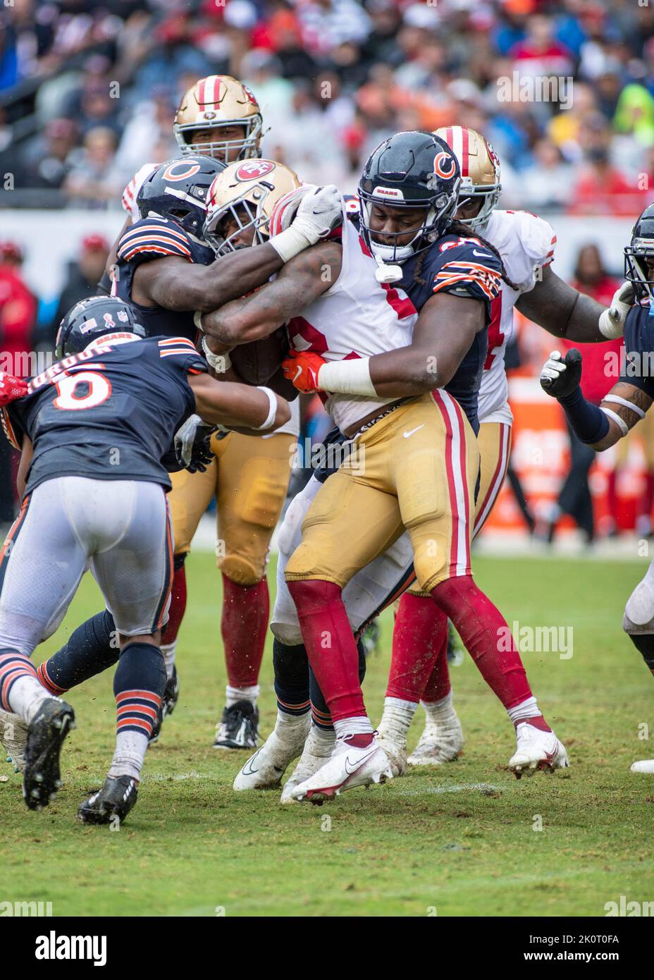 August 13, 2022: Chicago, Illinois, U.S. - Kansas City Chiefs #95 Justin  Watson is tackled by Chicago Bears #44 Matt Adams and #36 DeAndre  Houston-Carson during the game between the Kansas City