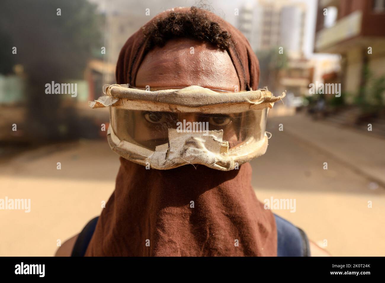 A protester looks on during a rally against the military rule following the last coup, in Khartoum, Sudan September 13, 2022. REUTERS/Mohamed Nureldin Abdallah Stock Photo