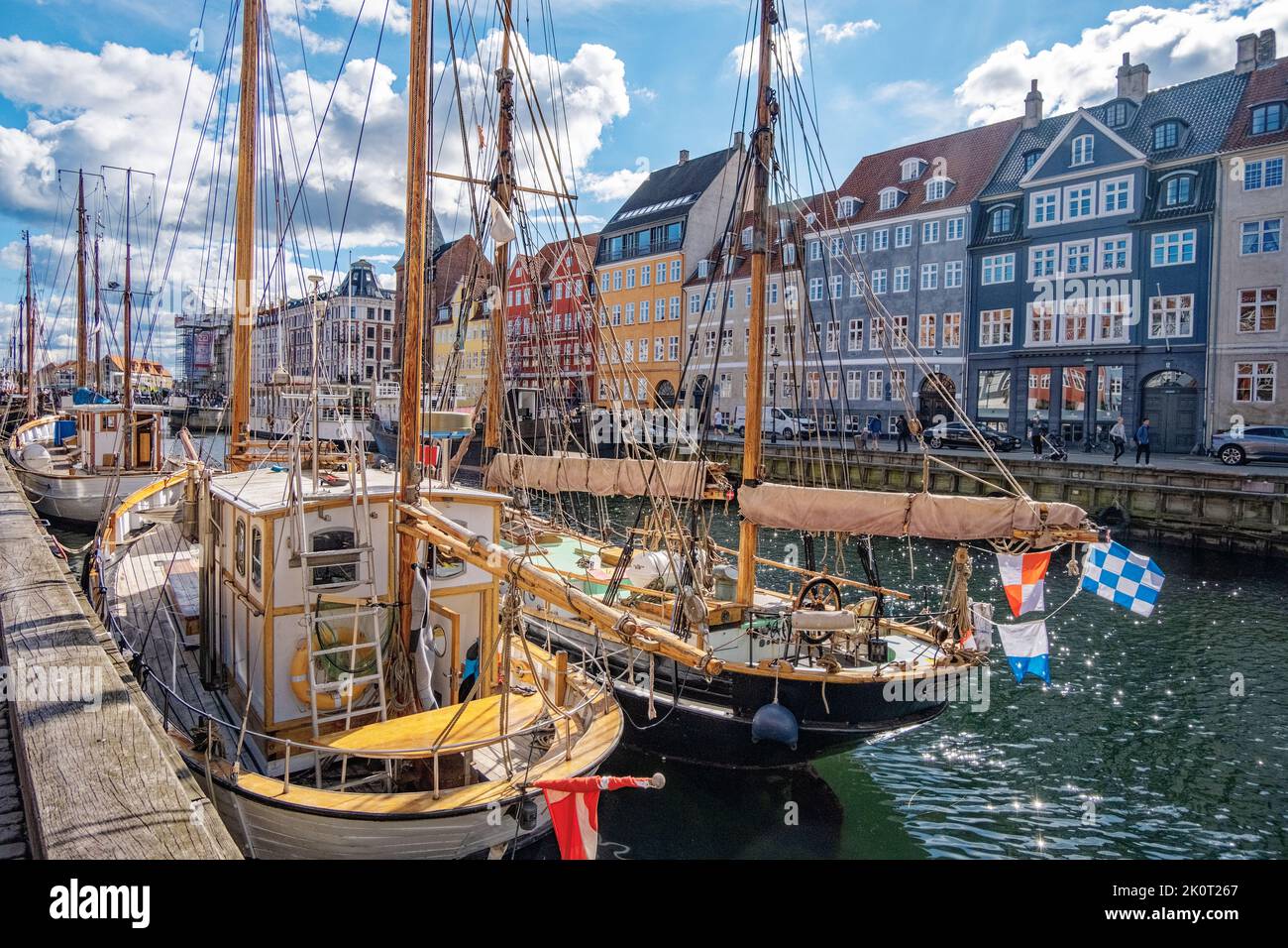Nyhavn canals with vintage ships, Copenhagen Denmark Stock Photo