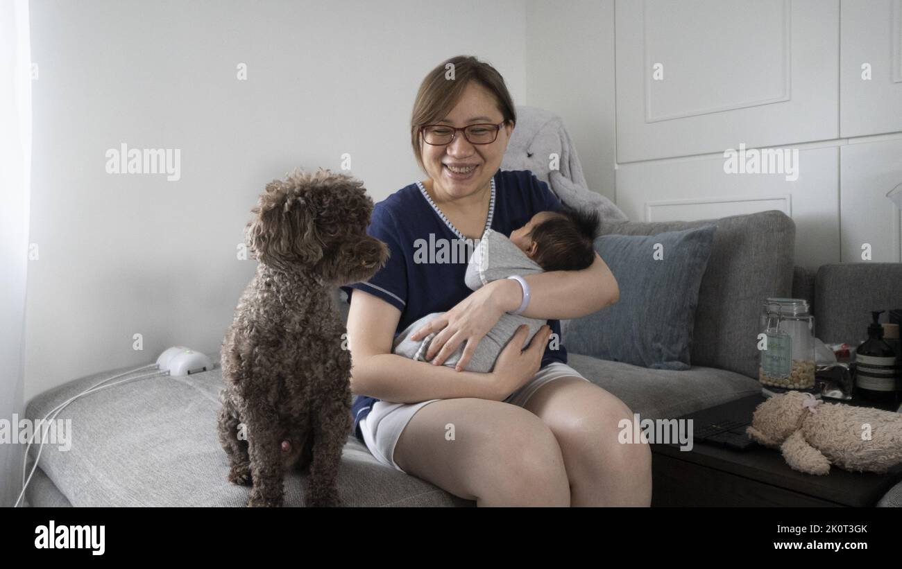 Carol Chan, confinement nanny, looks after new mother Karen Liu (unseen
