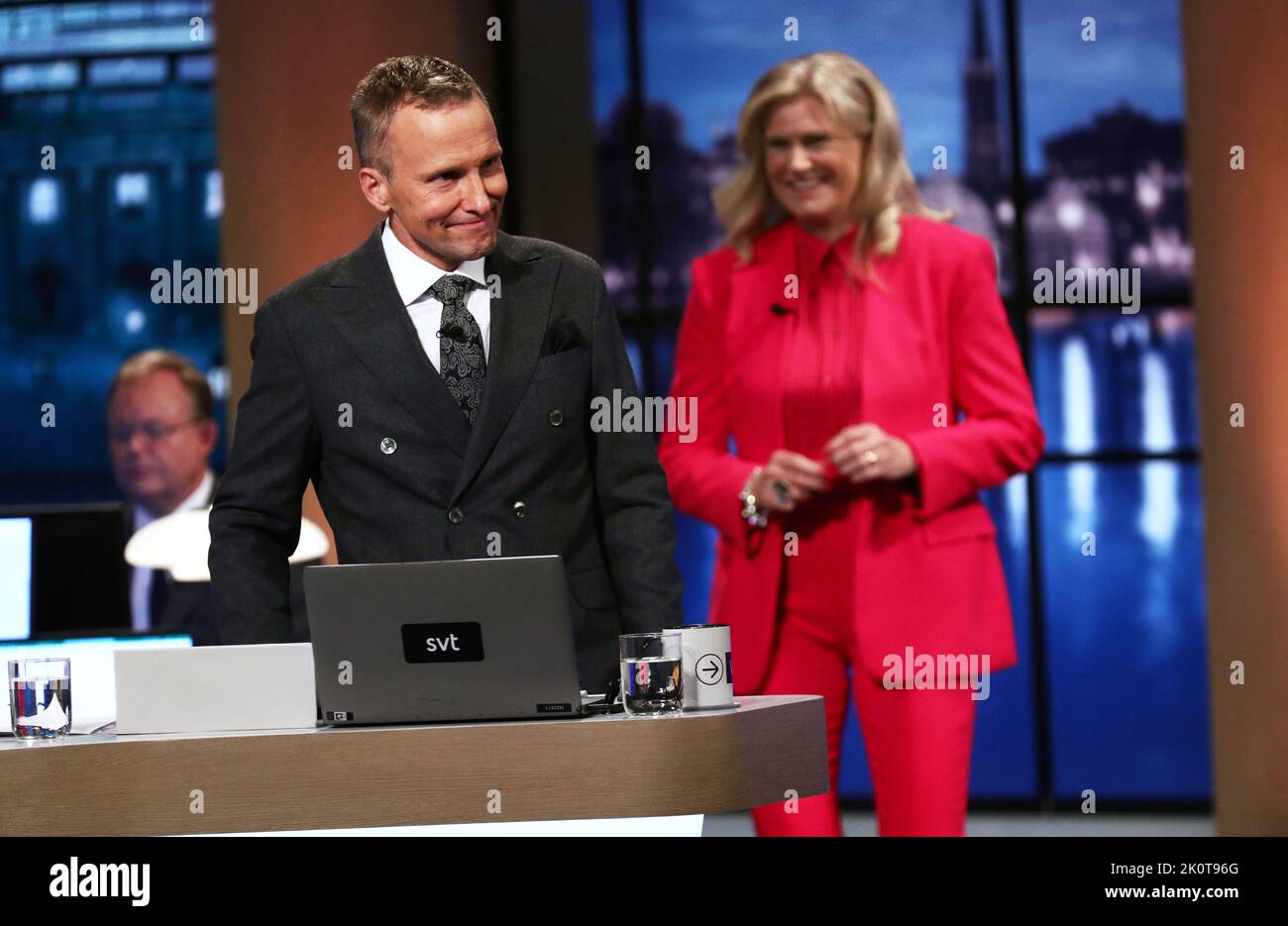 The Swedish parliamentary elections, election day, during Sunday in Stockholm, Sweden. In the picture: Sveriges Television's broadcast during election evening. In the picture: Anders Holmberg and Camilla Kvartoft. Stock Photo