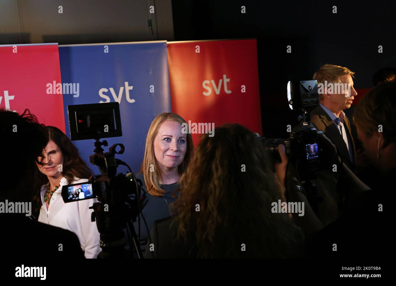 The Swedish parliamentary elections, election day, during Sunday in Stockholm, Sweden. In the picture: Sveriges Television's broadcast during election evening. In the middle: Annie Lööf, The Centre Party (In swedish: centerpartiet). To the left Märta Stenevi and to the right Per Bolund, The Green Party (Swedish: Miljöpartiet de gröna). Stock Photo