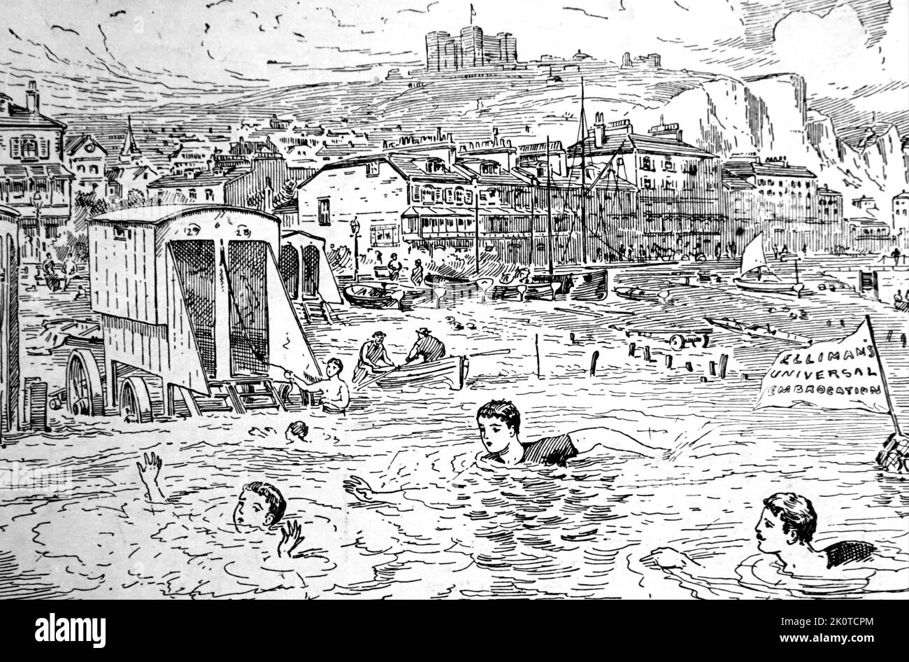 1892; illoustration showing a busy seaside scene with bathers, swimmers and holiday makers at an English, coastal resort Stock Photo