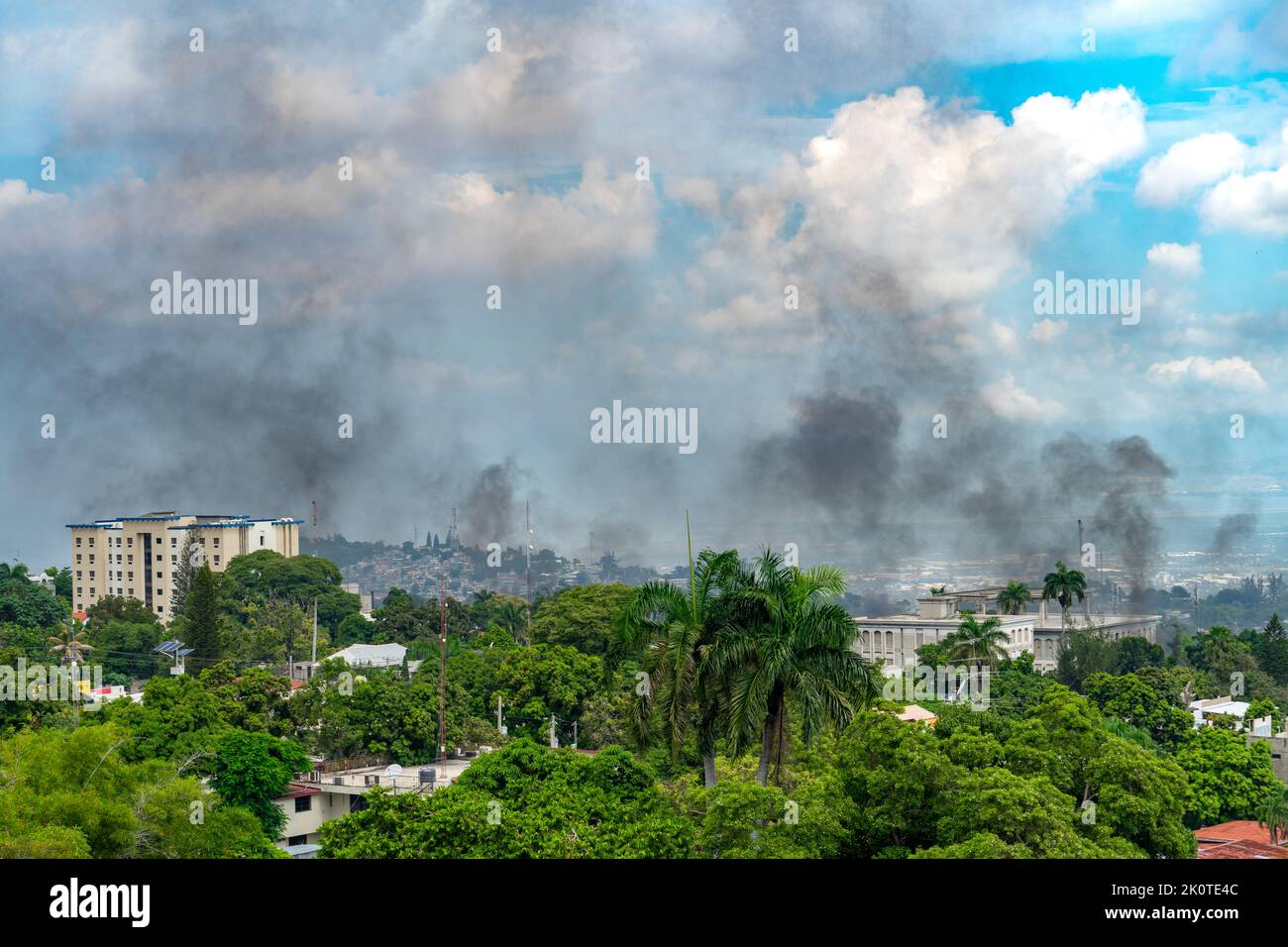 Civil unrest in Port-au-Prince, Haiti. The population is protesting against fuel shortage and inflation by paralyzing the city with burning tires Stock Photo