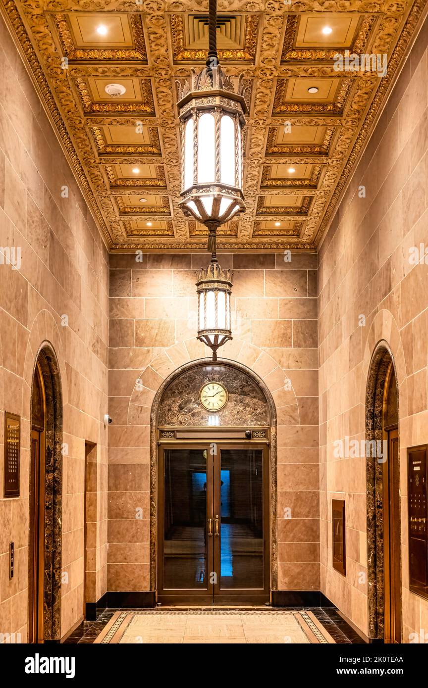 Interior architecture of an elevator corridor inside of the Canadian Imperial Bank of Commerce building located in King Street Stock Photo