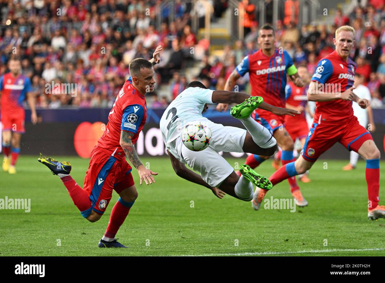 From left soccer players Jan Sykora of Viktoria Plzen and Denzel Dumfries of Inter Milan  in action during the Viktoria Plzen vs Inter Milan, 2nd round of group C of football Champions' League match in Pilsen, Czech Republic, September 13, 2022. (CTK Photo/Michal Kamaryt) Stock Photo