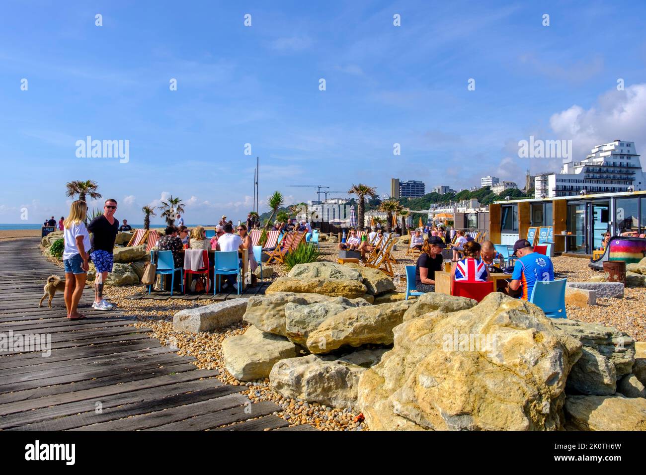 Folkestone, seaside cafes on the beach, by the boardwalk, Kent, UK Stock Photo