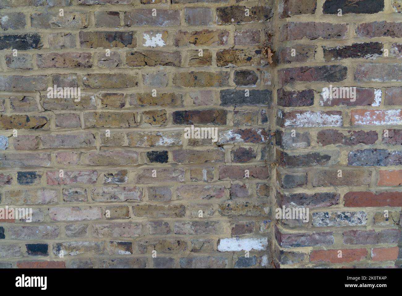 Facade evenly laid stones brick wall ashlar rails different colored as