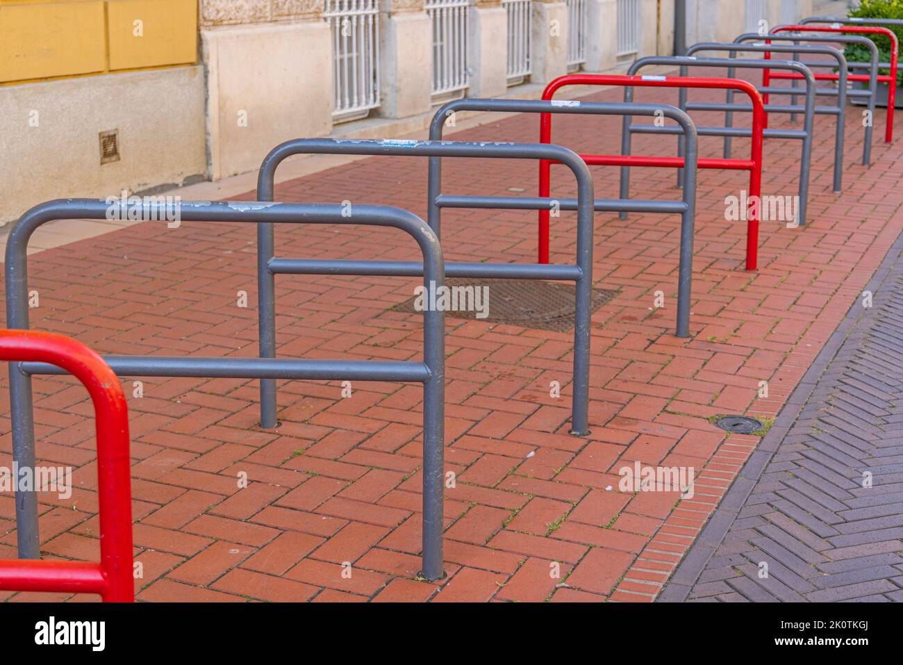 Empty Bicycle Parking Racks Poles Bollards in City Stock Photo