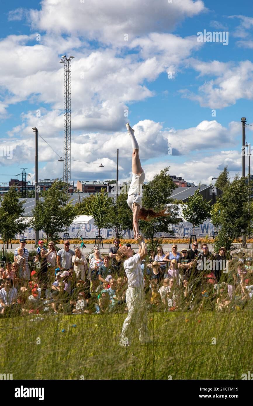 Pirie Poke acrobatic ground show at Katusirkuskarnevaali or Street Circus Carneval in Kalasatama district of Helsinki, Finland Stock Photo