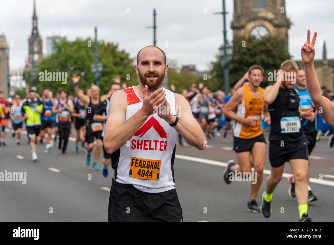Participants, Great North Run 2022 half marathon, in Gateshead, just after crossing over the Participants, Great North Run 2022 half marathon, in Gateshead, just after crossing over the
