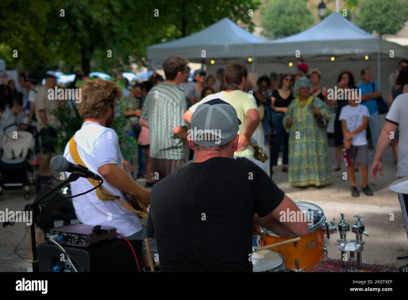 Drummer of a jazz band performing at a local festival in a park, Geneva Switzerland Stock Photo