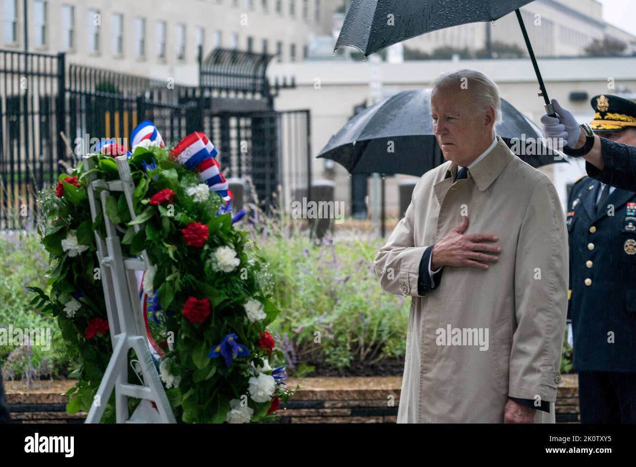 Washington, United States of America. 11 September, 2022. U.S President Joe Biden, salutes after placing a wreath at the National 9/11 Pentagon Memorial during a ceremony remembering the victims of the attacks, September 11, 2022 in Arlington, Virginia. The nation marked the 21st anniversary of the al-Qaida terrorists attacks that killed nearly 3,000 people.  Credit: Adam Schultz/White House Photo/Alamy Live News Stock Photo