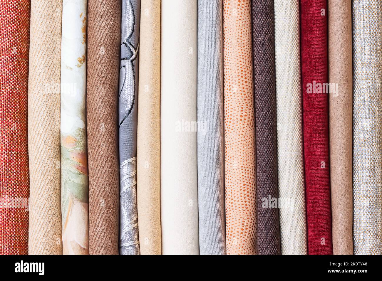 Rolls of colorful velours fabric. textile background Stock Photo