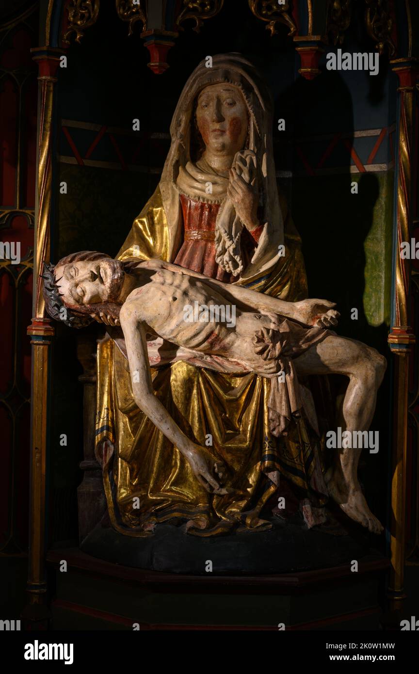 The Pietà the Virgin Mary cradling the dead body of Jesus. The