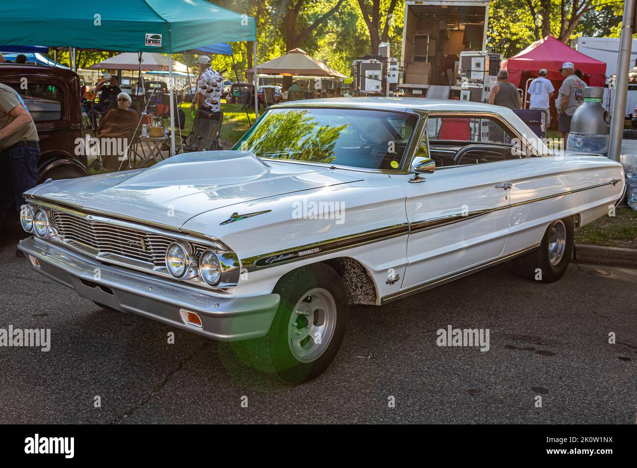 Falcon Heights, MN - June 18, 2022: High perspective front corner view of a 1964 Ford Galaxie 500 XL 2 Door Hardtop at a local car show. Stock Photo