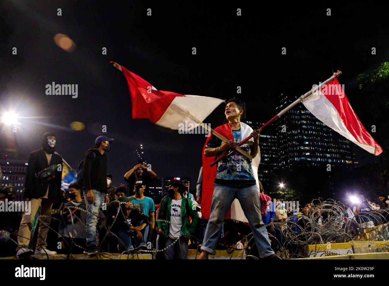 Jakarta, Indonesia. 13th Sep, 2022. A Protester Waves The Indonesian ...