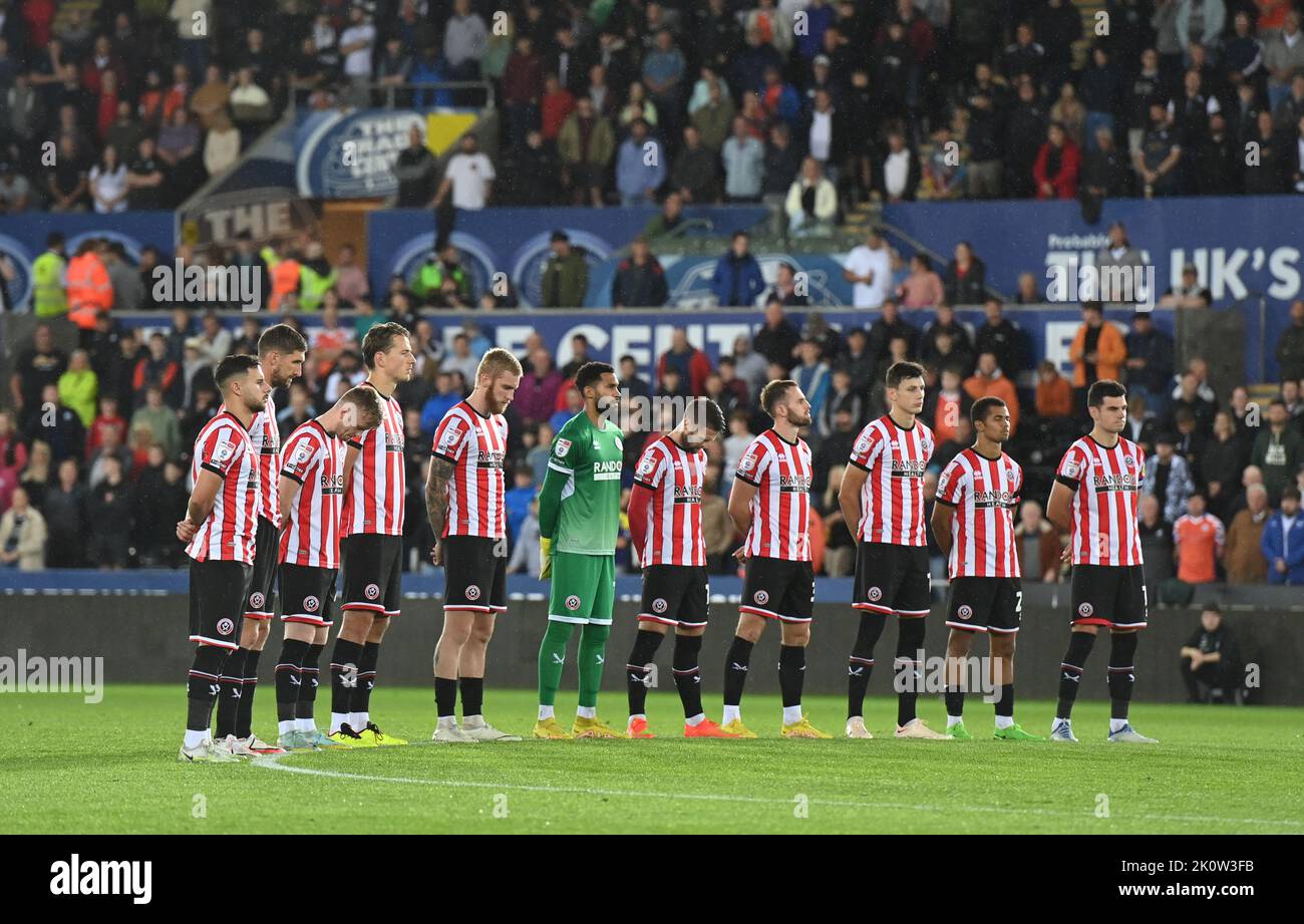 Swansea, UK. 13th Sep, 2022. The Sheffield Utd team during a minutes silence to mark the passing of Queen Elizabeth ll during the Sky Bet Championship match at the Liberty Stadium, Swansea. Picture credit should read: Ashley Crowden/Sportimage Credit: Sportimage/Alamy Live News Stock Photo