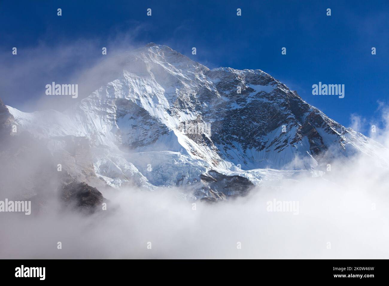 Mount Makalu with clouds, Nepal Himalayas mountains, Barun valley Stock Photo