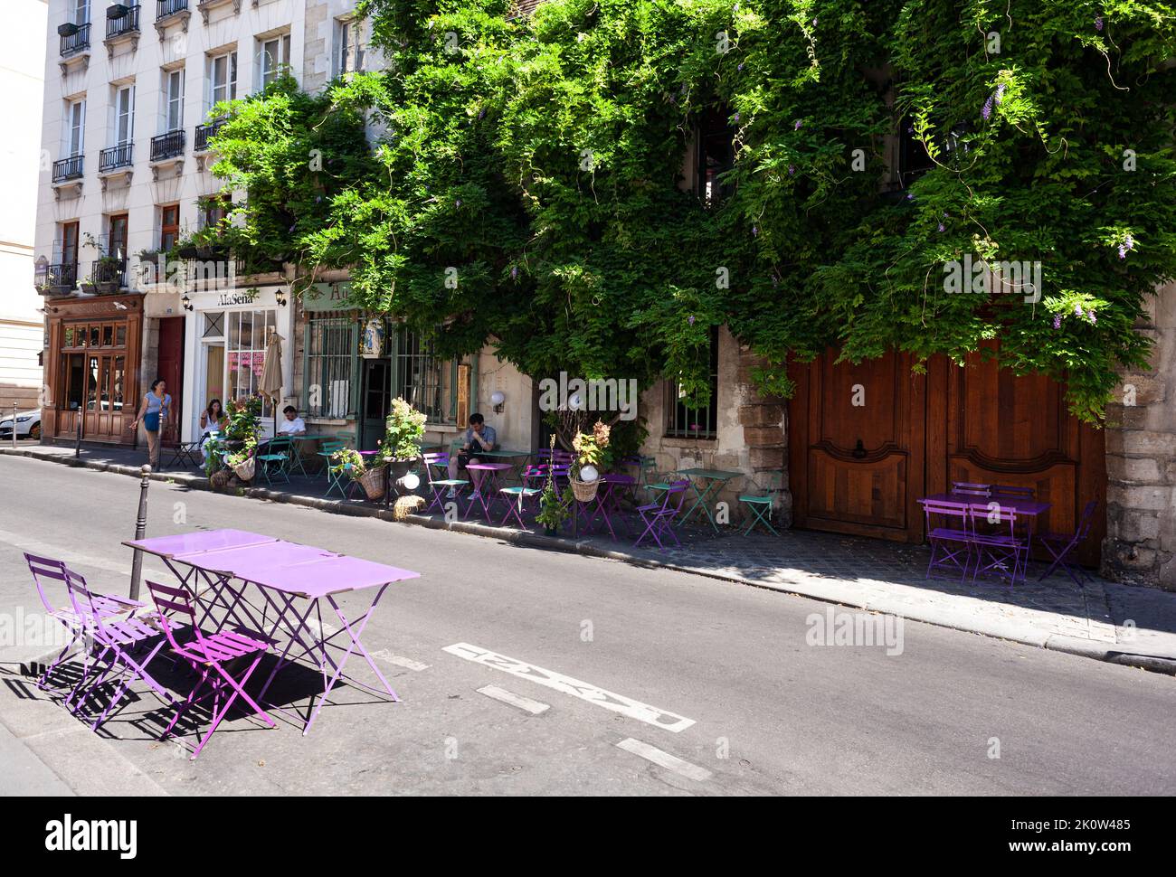 Paris, France - July, 15: The beautiful wisteria spring blossom in the heart of Paris at Au Vieux Paris D'Arcole on July 15, 2021 Stock Photo